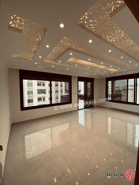 شقة طابق ثالث وروف دوبلكس مساحة 206م وتراسات 70م مطلة تشطيبات وديكورات فاخرة بسعر مميز للبيع في عمان - تلاع العلي