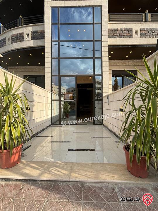 شقة شبه أرضية خلفية مع ترس ومدخل مستقل وكراج خاص مساحة 125م للبيع في عمان - طبربور أبو عليا