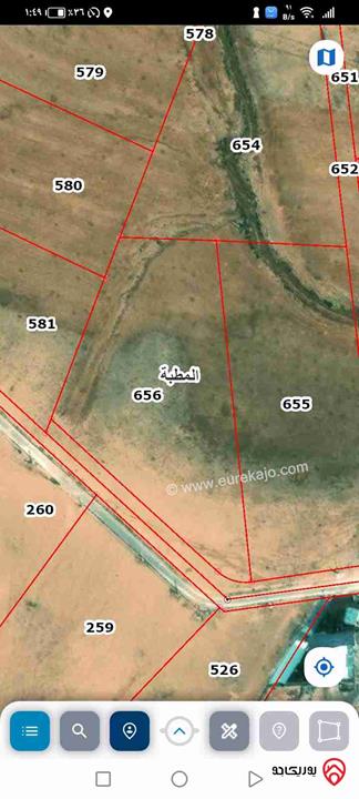 أرض للبيع مساحة 11150م في عمان - شرق الموقر المطبة الحنيفية على شارع 12 من المالك  مباشرة