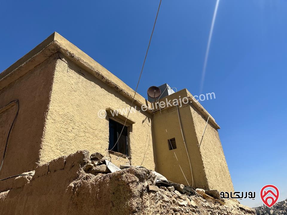 قطعة أرض مع منزل قديم مساحة 280م للبيع في عمان - جبل القلعة 