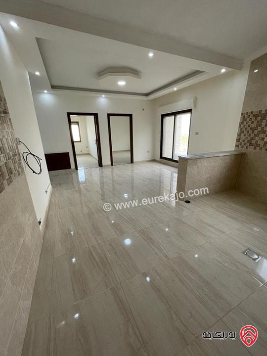 شقة ارضية يمين مع ترس مساحة 130م للبيع في عمان - ضاحية الرشيد