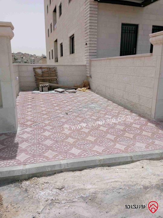 شقة مساحة 210م طابق أرضي مع ترس 30م بناء جديد للبيع في عمان - شفا بدران الكوم 