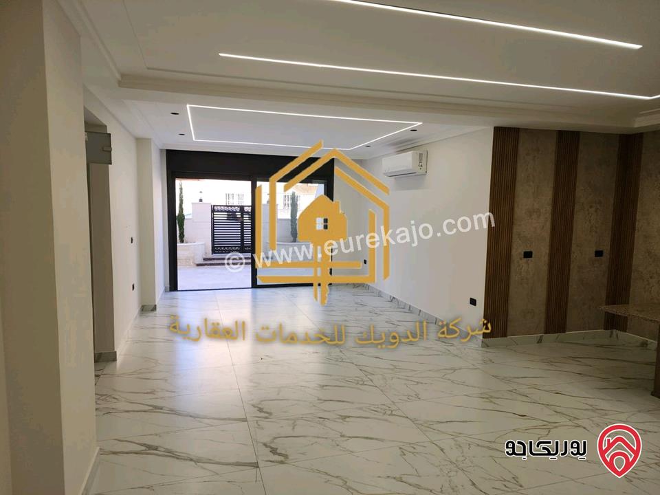 شقة جديدة لم تسكن طابق ارضي مساحة 110م مع ترس 50م للإيجار في عمان - ضاحية الرشيد 