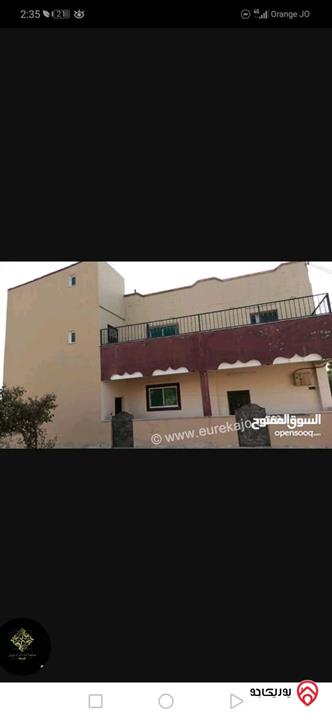 بيت طابقين على مساحة ارض دونم مسطح كل طابق 150متر للبيع في مادبا - ذيبان