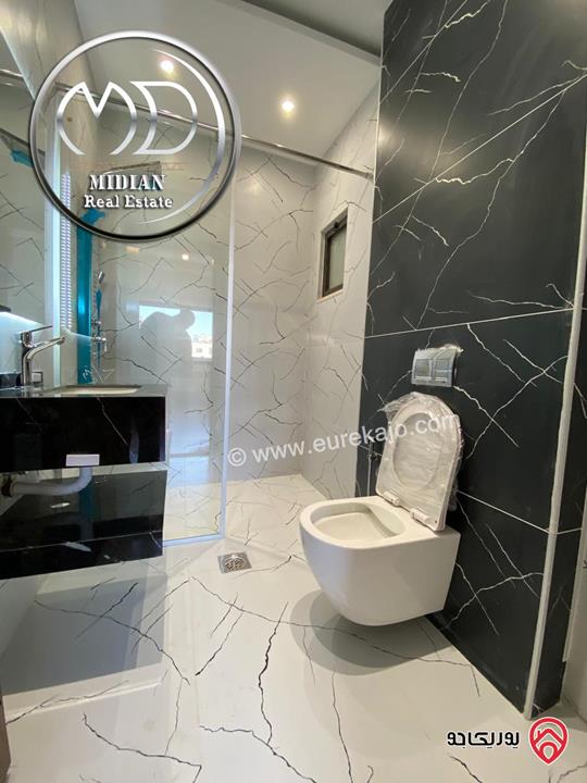 شقة أرضية جديدة للبيع في عمان - الظهير مساحات 200م مع تراسات تشطيبات و ديكورات سوبر ديلوكس بسعر مميز