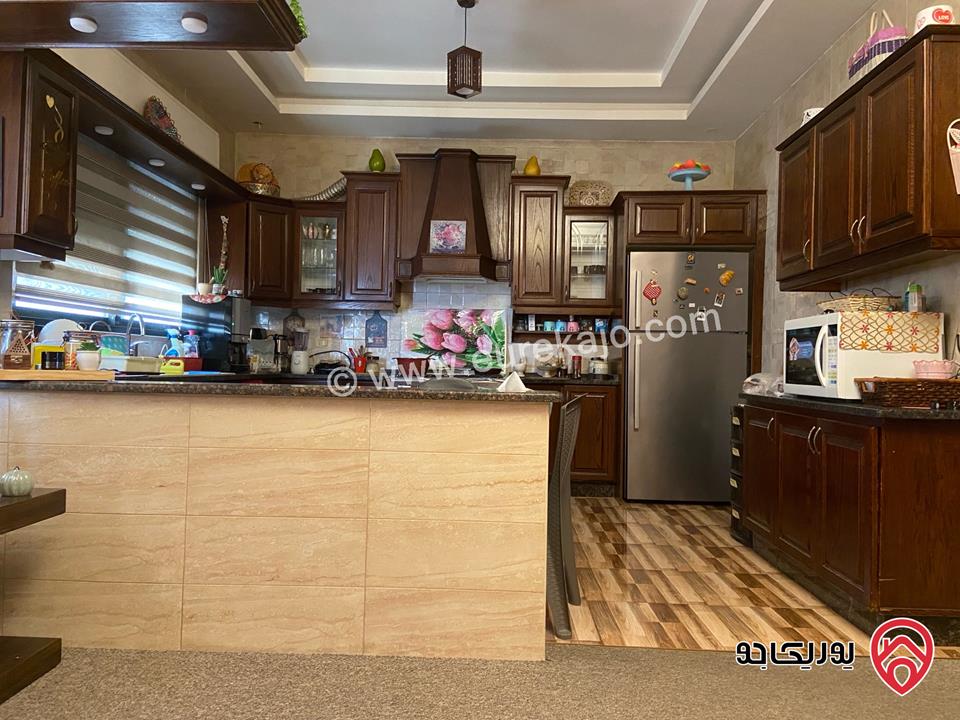 شقة أرضية مساحة 165م للبيع في عمان - تلاع العلي