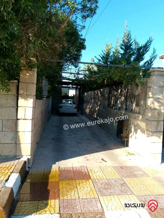 بيت مشترك طابقين حجر مساحة 300م على أرض 539م للبيع في عمان - جاوا/ آشكو 