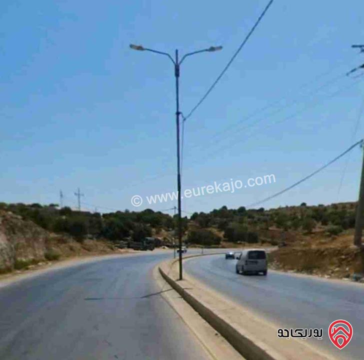 ارض زراعية مساحة 2 دونم و 721م للبيع في عجلون عبين بالقرب من الطريق الرئيسي