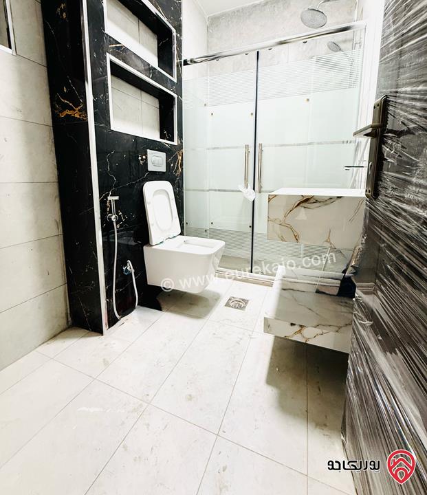 شقة ارضية مساحة 220 متر جديدة للبيع في عمان - طبربور 