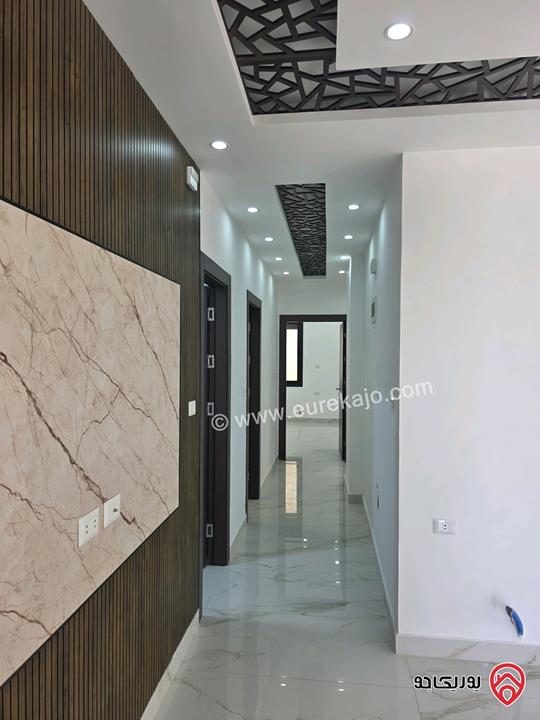 شقة أرضية مساحة 143م مع باركنج وترس ومدخل خاص 50م للبيع في عمان - شفا بدران