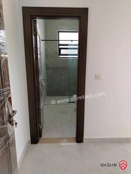 شقة مميزة طابق ارضي معلق مساحة 230م للبيع في عمان - دير غبار