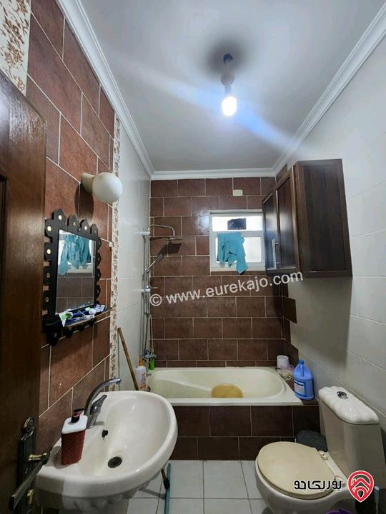 شقة شبه أرضية مساحة 150م داخلي و 120م خارجي للبيع في اربد - الحي الشرقي