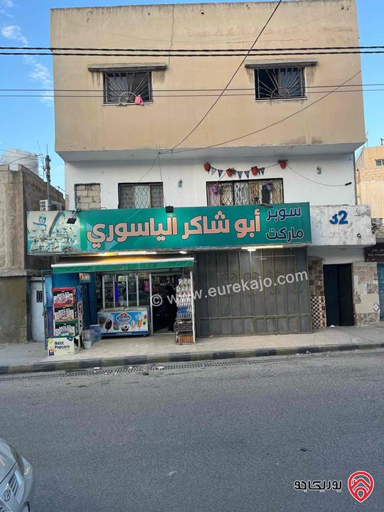 عمارة مكونة من ثلاث طوابق + بيت جانبي + مخازن عدد2 على أرض 254م للبيع في الرصيفة حي المشيرفة