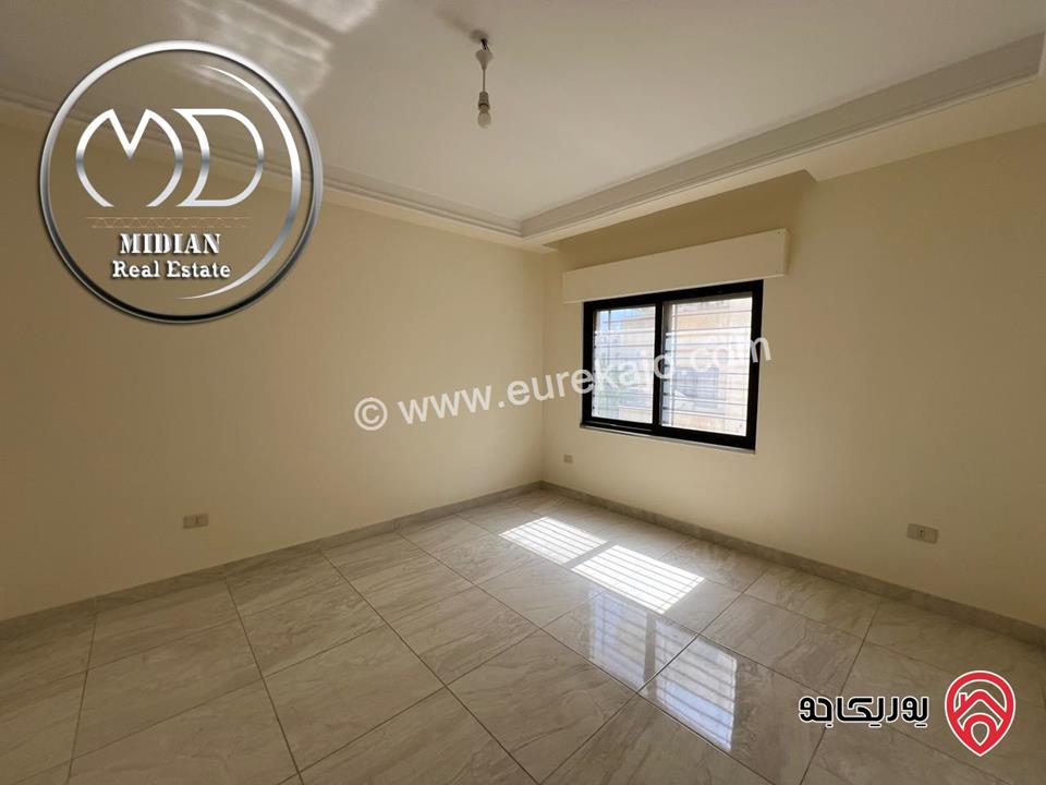 شقة شبه ارضي للبيع في عمان - ضاحية النخيل مساحة 190م مع ترس و حديقة 150م تشطيبات سوبر ديلوكس جديدة لم تسكن