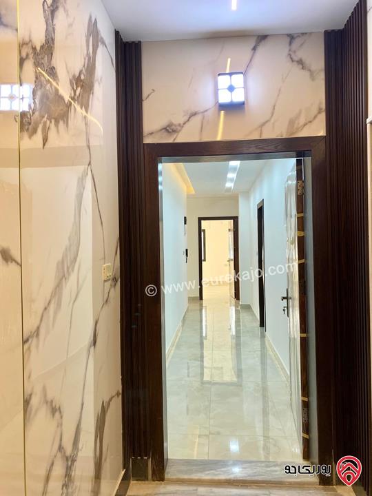 شقة مميزة طابق ارضي مساحة 145م للبيع في عمان - ابو علندا 