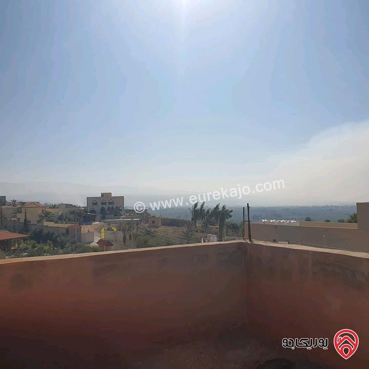 قطعة أرض مساحة 594م عليها بيت طابقين للبيع في البحر الميت جوفة الكفرين 