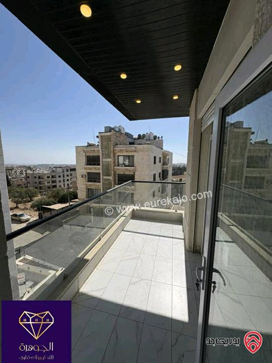 شقة طابق اخير مع روف دوبلكس فاخر مساحة 210م لم يسكن للبيع في عمان - خلدا