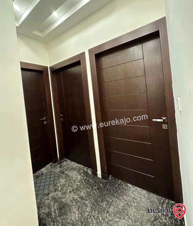 شقة طابق ارضي معلق مساحة 150م مع ترس 40م للايجار في عمان - البنيات 