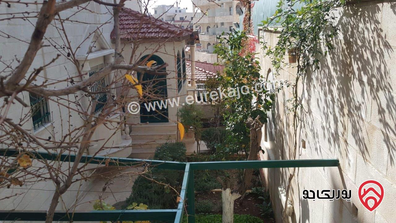 عقار (فيلا مع تسوية و مبني شقتين) مساحة البناء 956م على أرض 944م للبيع في عمان - تلاع العلي 