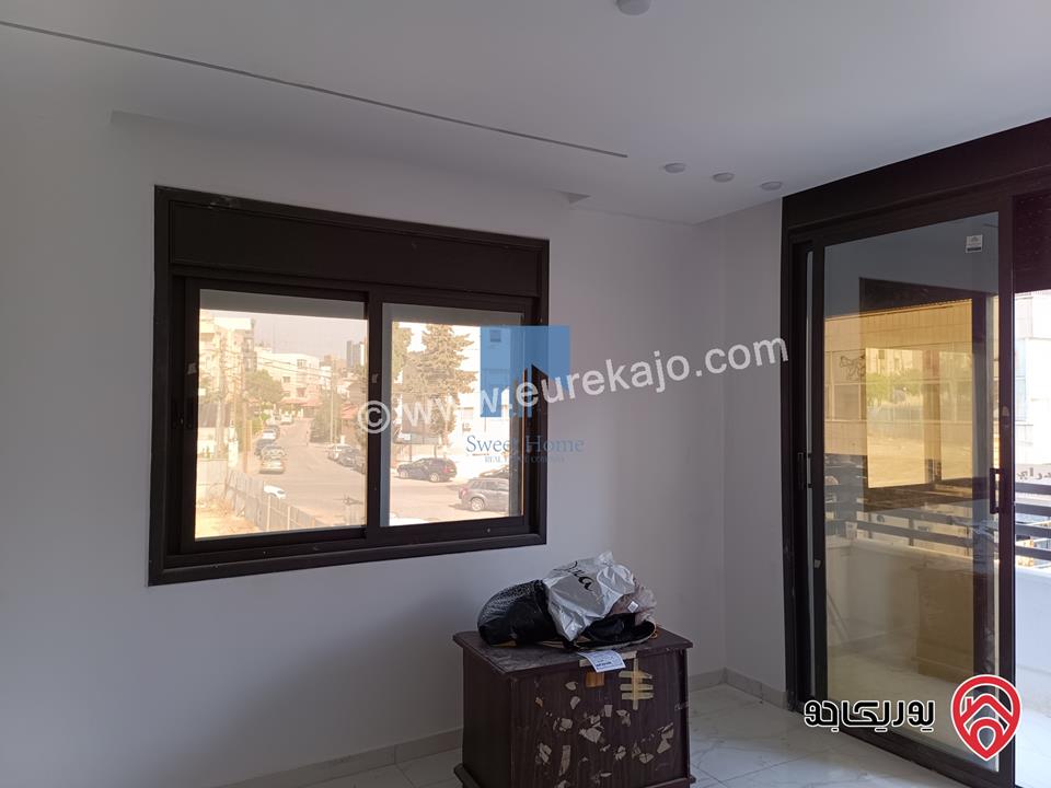 شقة فاخرة للبيع في عمان - الجندويل - قرب لارسا ومقابل شركة زين طابق اول 115م تشطيب سوبر ديلوكس لم تسكن