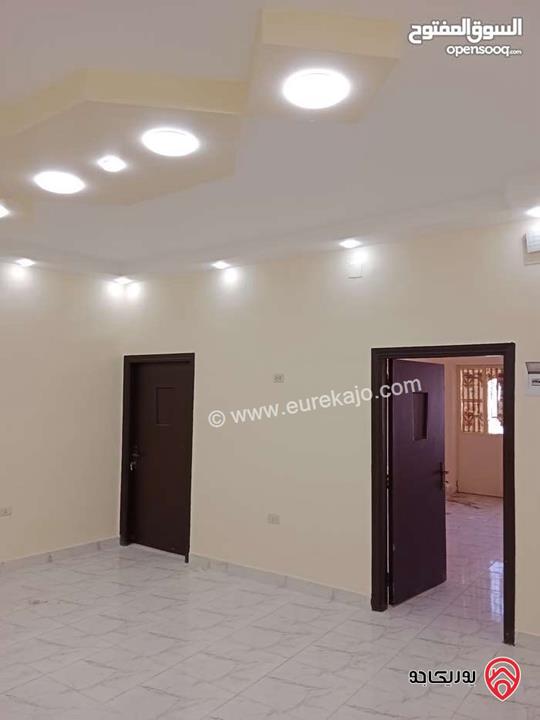 عمارة مكونة من طابقين و شقتين طابق أول مساحة كل شقة 110م للبيع في عمان - الوحدات شارع مادبا