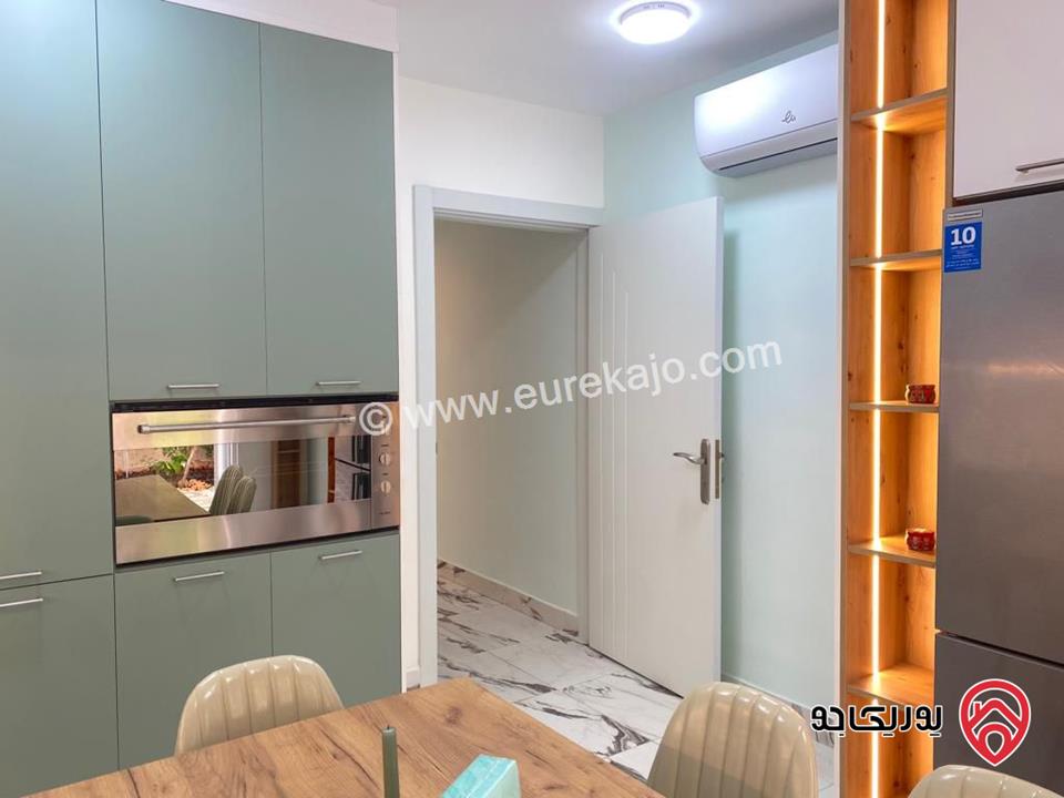 شبه فيلا متلاصقة مفروشة للبيع في عمان - ام السماق مساحة الارض 150م ومساحة البناء 180م بسعر مغري