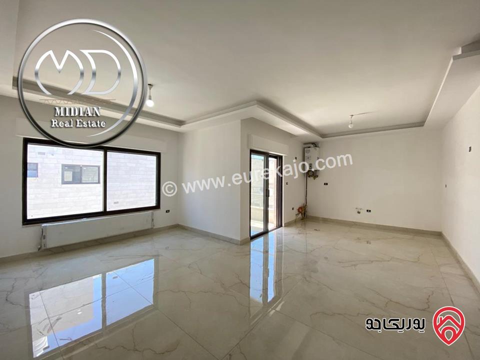 شقة شبه ارضي جديدة للبيع في عمان - ام السماق مساحة 200م مع ترس و حديقة 200م تشطيبات ديكورات سوبر ديلوكس بسعر مميز