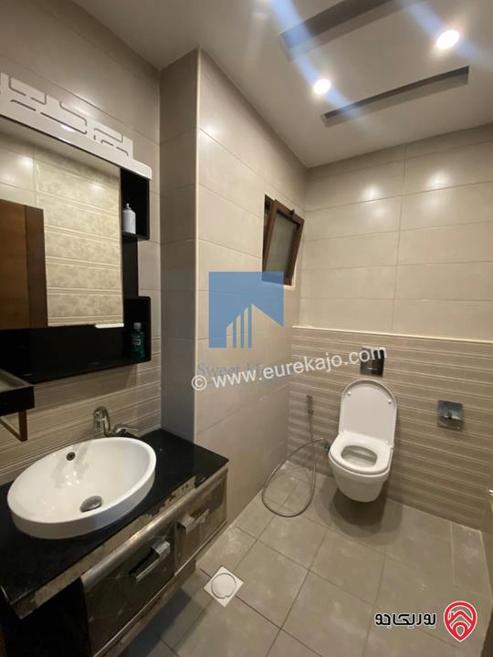 شقة أرضية مفروشة فاخرة للبيع في عمان - أم السماق مساحة 245م مع حديقة وترسات 120م