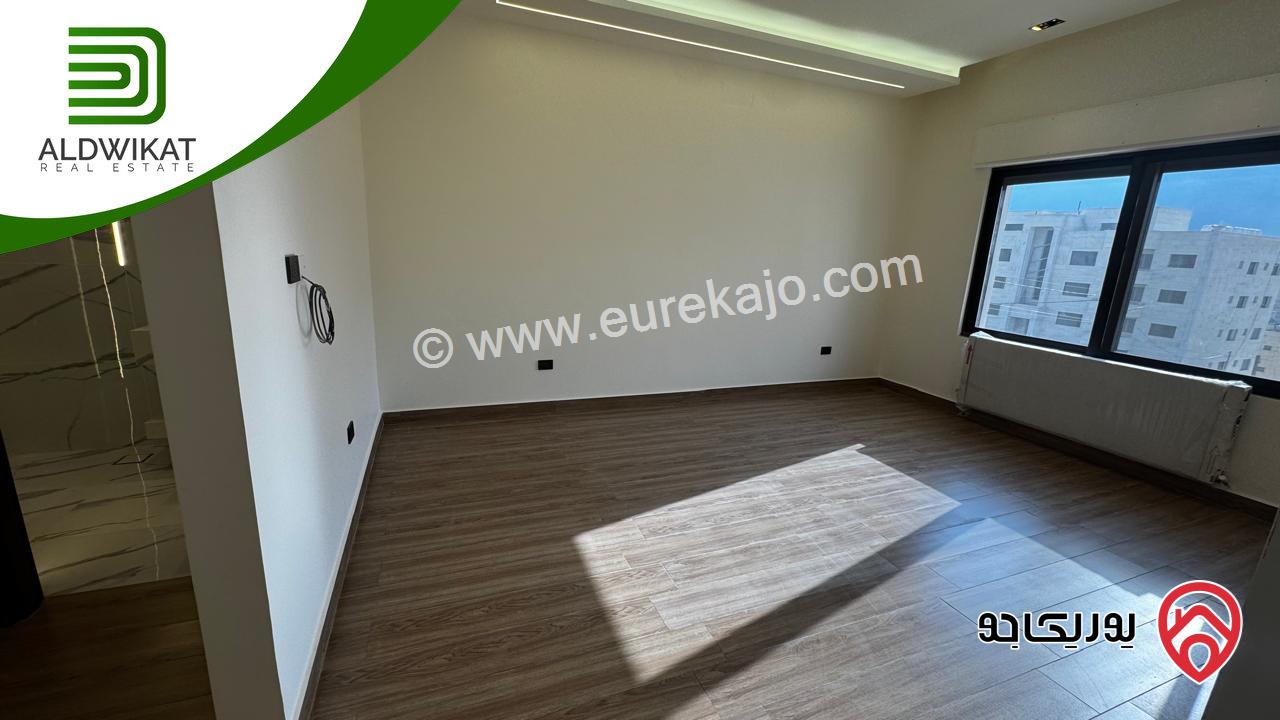 شقة ارضية للبيع في عمان - خلدا مساحة البناء 250 م والترس 80م موقع مميز واطلالة