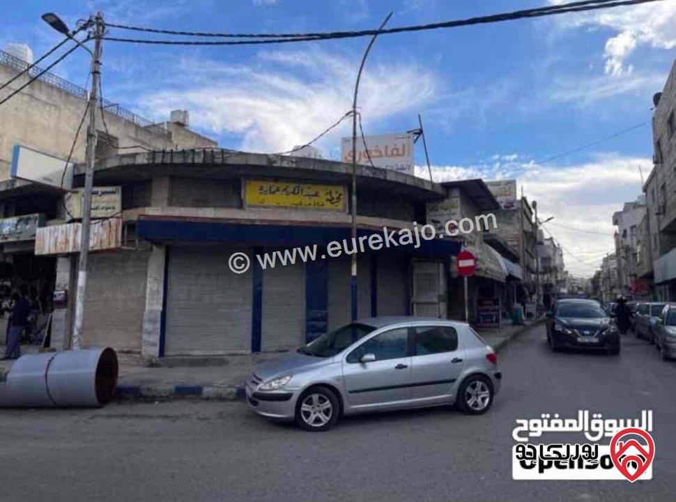 أرض ومحلات تجارية مساحة 460م مربع للبيع في اربد مقابل مجمع الغور القديم (قابل للتفاوض)