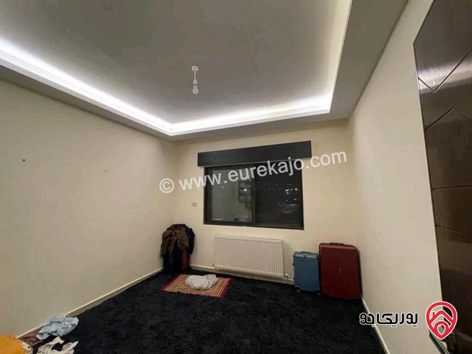 شقة أرضية مساحة 151م داخلي و 150م خارجي للبيع في عمان - قرب جامعة البتراء على شارع المطار