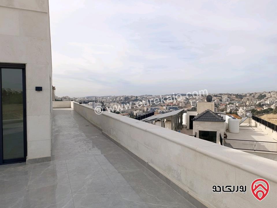روف طابقي مميز مساحة البناء 155م والترسات 188م للبيع في عمان - دابوق
