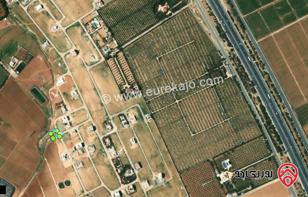 قطعة ارض مساحة 498م للبيع من أراضي جنوب عمان - الطنيب واجهة على الشارع منطقة فلل ومطلة على جامعة الاسراء