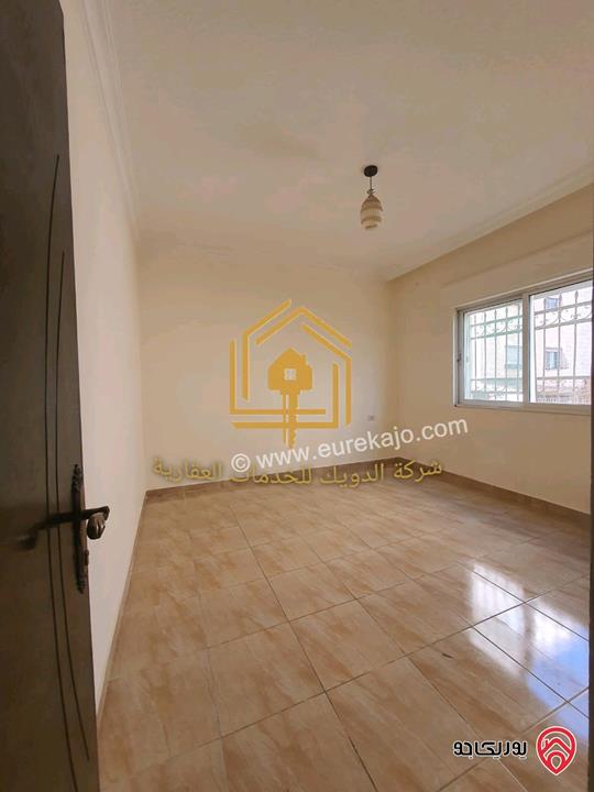 شقة فارغة طابق ارضي مساحة 150م داخلي مع 50م ترس للإيجار في عمان - ضاحية الأقصى 