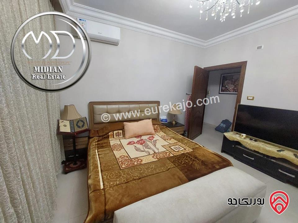 شقة ارضية للبيع في عمان - حي الصحابة مساحة 205م مع ترس و حديقة 70م تشطيبات ديكورات سوبر ديلوكس بسعر مميز