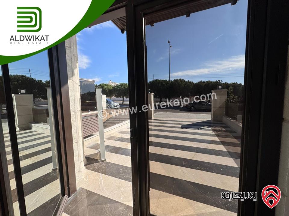 شقة ارضية معلقة للبيع في عمان - خلدا العوجانية المساحة 220م ترس 15م موقع مميز