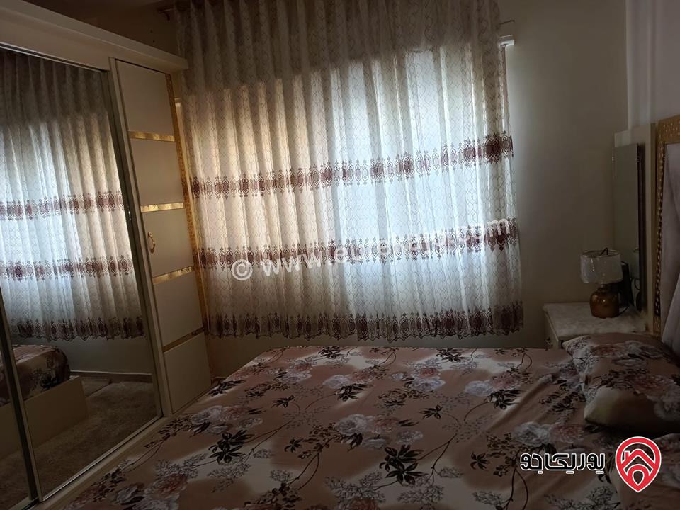 شقة سوبر ديلوكس طابق أرضي مساحة 145م مسطح بناء + ترسات 110م للبيع في عمان - طريق المطار 