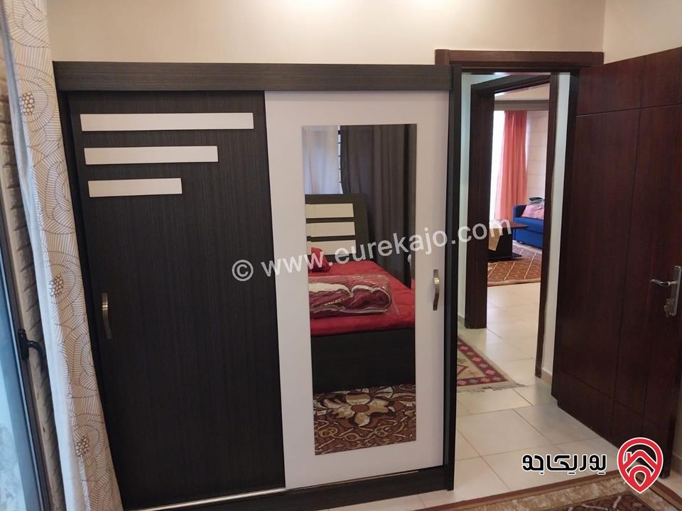 شقه للايجار في عمان - الدوار السابع مساحة 80م + 130م شبه ارضي قرب الترخيص