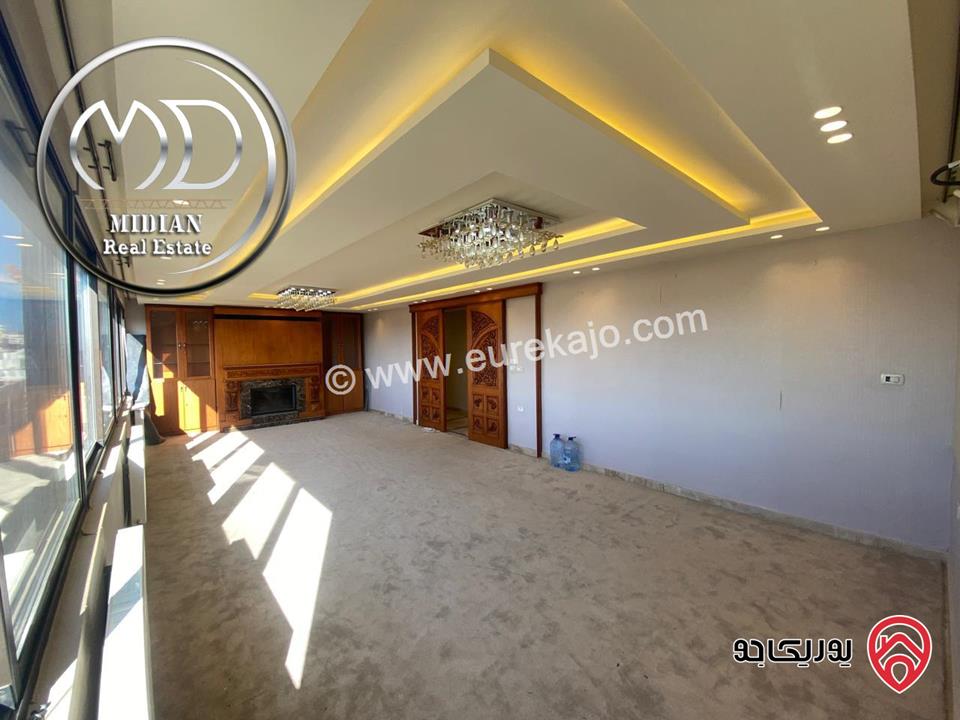 شقة للايجار طابق أخير مع روف في عمان - خلدا - العوجانية مساحة 425م مع تراسات تشطيبات ديكورات فاخرة اطلالة بانورامية خلابة