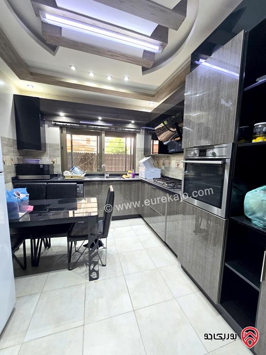 شقة ارضية مساحة 131م مع تراس 50م ومدخل خاص للبيع في عمان - الرابية 