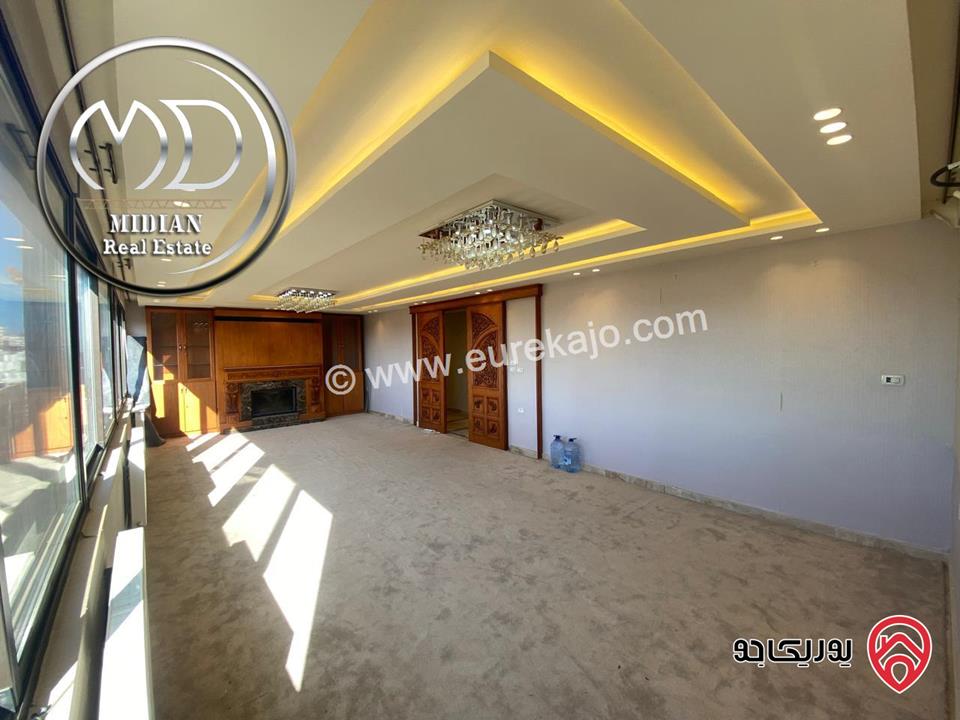 شقة للايجار طابق أخير مع روف في عمان - خلدا - العوجانية مساحة 425م مع تراسات تشطيبات ديكورات فاخرة اطلالة بانورامية خلابة