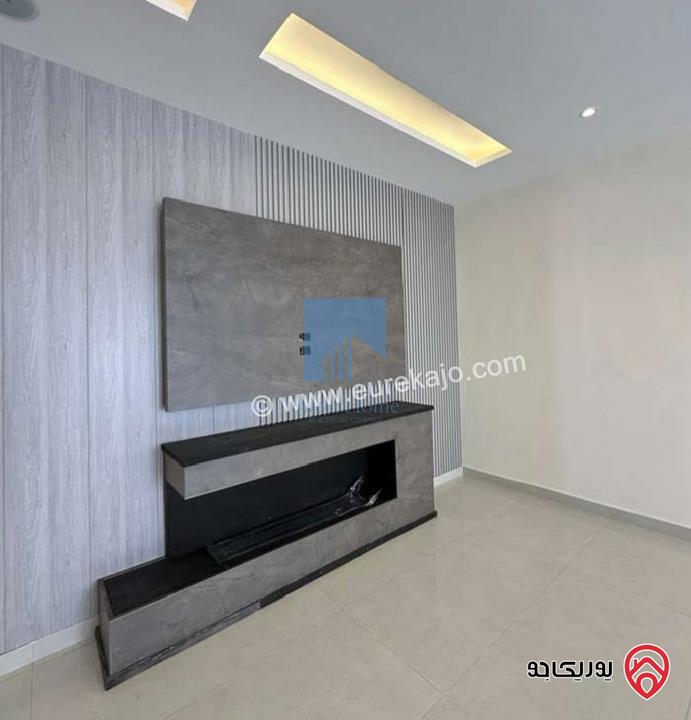 شقة أرضية فاخرة للبيع في عمان - تلاع العلي - خلف طواحين الهوا 180م مع ترس 40م لم تسكن