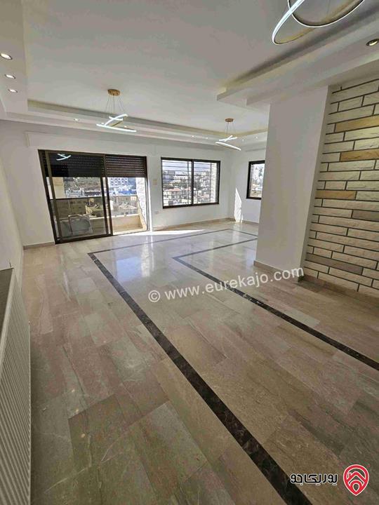 شقة مساحة 175م طابق ثاني للبيع في عمان - خلدا مطلة علي دابوق بسعر مميز 