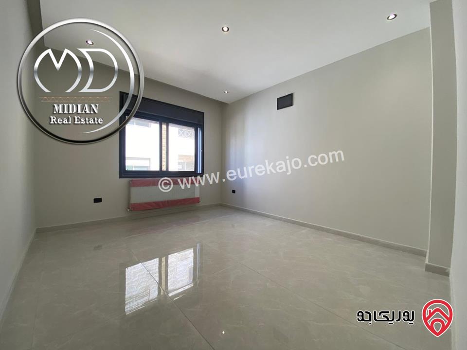 شقة ارضية جديدة للبيع في عمان - تلاع العلي مساحة 210م مع ترس و حديقة 140م تشطيبات ديكورات عصرية فاخرة بسعر مميز