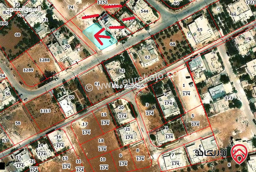 قطعة ارض مساحة 517م للبيع من أراضي جنوب عمان - خريبة السوق وجاوا على شارعين منطقة سكنية واصل كل الخدمات