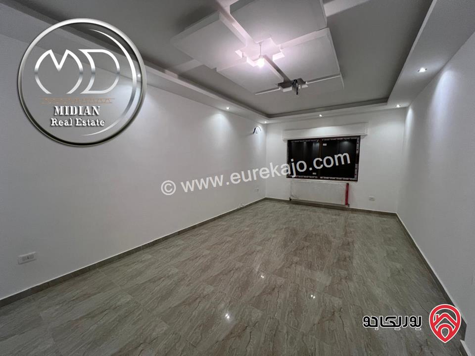 شقة ارضية جديدة فارغة للايجار في عمان - ضاحية الرشيد مساحة 150م مع ترس 50م تشطيبات سوبر ديلوكس بسعر مميز