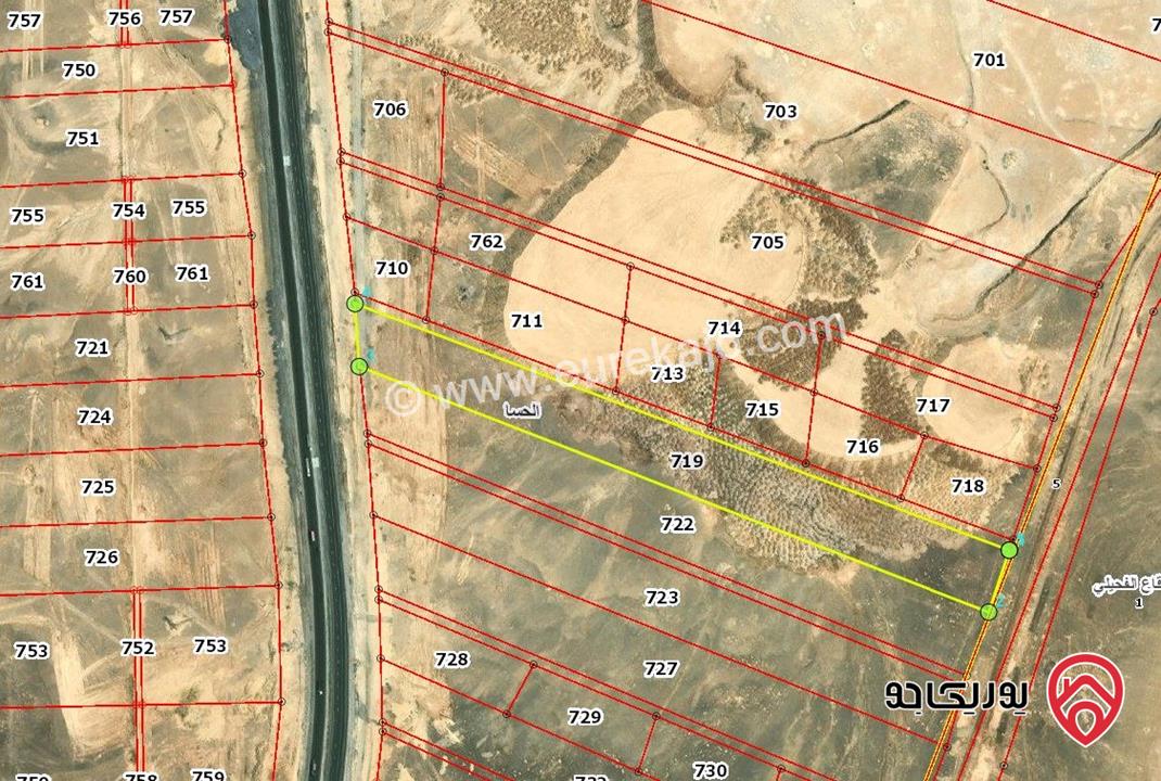 قطعة أرض مساحة 42 دونم للبيع في الطفيلة على شارع عمان العقبة الرئيسي وبسعر مغري