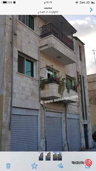 عمارة للبيع في جبل عمان ثلاث طوابق وثلاث مستودعات