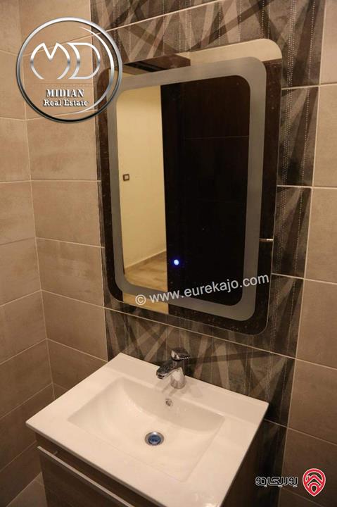 شقة شبه ارضي فارغة للايجار في عمان - ضاحية النخيل مساحة 200م مع ترس و حديقة 250م تشطيبات ديكورات عصرية فاخرة