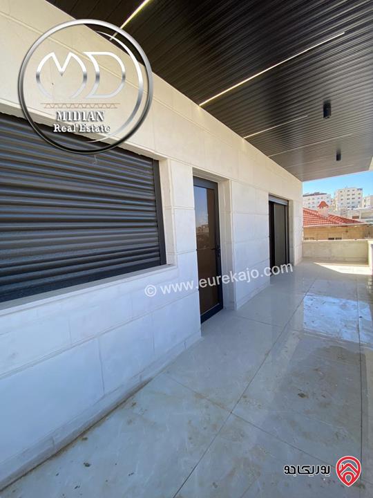 شقة ارضية جديدة للبيع في عمان - تلاع العلي مساحة 210م مع ترس و حديقة 140م تشطيبات ديكورات عصرية فاخرة بسعر مميز